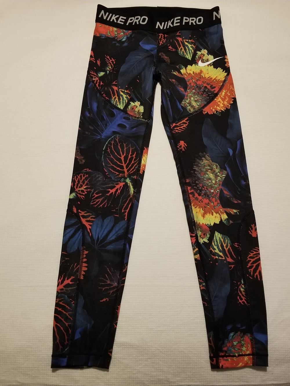 Nike Pro Girl's Small Black With Blue, Orange, & Yellow Floral Print Leggings